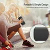 Two women sitting outdoors, one holding a portable speaker. Produktbild-Vorschau