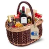 A gift basket filled with wine, chocolates, and other treats, with a "Made in EU" tag. Náhľad obrázku produktu