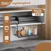 A hanging basket filled with toiletries is placed under a shelf in a closet. Produktbild-Vorschau