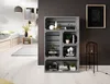 A room with a bed, a bookshelf made of wooden crates, and a floor lamp. Produktbild-Vorschau