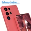 A close-up shot of a red smartphone case with a camera cutout, and a second phone with a landscape image on its screen, partially visible. Produktbild-Vorschau