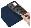 A hand is shown placing a phone into a blue flip case. Náhľad obrázku produktu