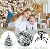 A mother and daughter are lying on the floor in front of a decorated Christmas tree, with gift boxes in the background. Produktbild-Vorschau