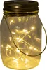 A close-up shot of a solar-powered LED mason jar light. Náhľad obrázku produktu