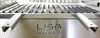 A close-up view of a stainless steel grill grate with the brand name 'LISA' and 'Made in Italy' etched into the surface. Produktbild-Vorschau