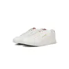 A pair of white sneakers with brown accents, shown from a side-diagonal angle on a white background. Voir les images du produit