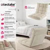 A floor chair displayed in a bedroom setting, highlighting its features and design. Náhled obrázku produktu