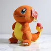 A plush toy of the Pokemon Charmander is shown sitting on a marble-like surface against a plain background. Produktbild-Vorschau
