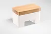 A white butter dish with a wooden lid on a white background. Podgląd zdjęcia produktu