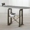 An ironing board with an iron and a steam generator on a shelf below. Voir les images du produit