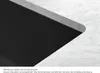 Close-up view of a black sink edge with a marble countertop. Podgląd zdjęcia produktu