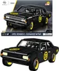 A product image showing a black toy car model with yellow accents, presented in two views: one as part of packaging and another as a standalone product shot. Podgląd zdjęcia produktu
