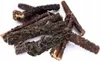 A pile of dried beef jerky dog treats on a white background. Anteprima dell’immagine prodotto