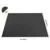 A black yoga mat is shown from a slightly elevated angle, with dimensions indicated by text overlays. Voir les images du produit