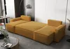 A modular yellow sofa is shown in a modern living room setting with a floor lamp and a coffee table in the foreground. Voir les images du produit