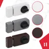 A collage of three different colored door locks, each with a sample color swatch next to it, set against a blueprint background. Produktbild-Vorschau
