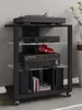 A multi-shelf audio rack with various electronic components and accessories. Voir les images du produit
