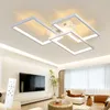 A modern living room with a large TV, sofa, coffee table, and a contemporary ceiling light. Produktbild-Vorschau