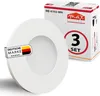 A white circular LED light is shown in the foreground, with a product box in the background. Produktbild-Vorschau