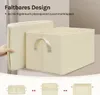 A hand is shown folding a cream-colored storage box, demonstrating its collapsible design. Below, three sequential images illustrate the folding process. Produktbild-Vorschau