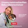 A woman is holding a baby in a carrier, and the baby is wearing ear protection. The background is pink. Anteprima dell’immagine prodotto