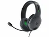 A black and gray gaming headset with a green accent is shown against a white background. Produktbild-Vorschau