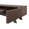 A close-up view of a wooden TV stand with one door open, revealing a slatted design. Produktbild-Vorschau