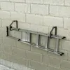 A ladder is mounted on a wall using black metal brackets. Produktbild-Vorschau