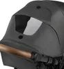 A close-up view of a stroller canopy and handle. Produktbild-Vorschau