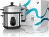 A rice cooker with a steaming attachment and its packaging, along with a measuring cup and spoon. Produktbild-Vorschau