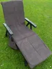 A brown terry cloth cover is draped over a recliner chair on a green lawn. Produktbild-Vorschau