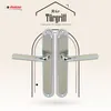 A marketing image showcasing two silver and white door handles against a light beige and white patterned background, with decorative arch elements. Produktbild-Vorschau