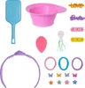A collection of Barbie-themed styling accessories laid out on a white background. Produktbild-Vorschau