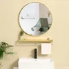 A bathroom scene with a sink, faucet, mirror, shelf, and towel. Náhľad obrázku produktu