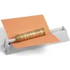 A coin roller with a stack of coins on a piece of orange paper, set against a white background. Produktbild-Vorschau