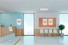 A waiting area in a clinic or office with social distancing markers and informational posters. Voir les images du produit