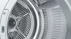 Close-up view of the inside of a washing machine drum. Produktbild-Vorschau