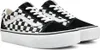 A pair of Vans Old Skool Platform sneakers with a black and white checkerboard pattern and white soles, shown from a side angle on a white background. Anteprima dell’immagine prodotto