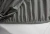 A close-up view of a fitted sheet with elastic edging. Produktbild-Vorschau
