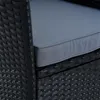 A close-up view of a black poly-rattan chair with a gray cushion. Produktbild-Vorschau