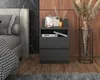 A modern bedroom setting with a nightstand next to a bed. Náhľad obrázku produktu