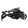 A folded baby stroller on a white background. Podgląd zdjęcia produktu