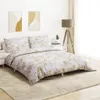 A bedroom scene with a bed, nightstands, and artwork. Podgląd zdjęcia produktu