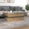 A living room scene with a couch, coffee table, and plant. Náhľad obrázku produktu