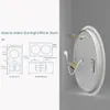 Diagrams showing how to select the right mirror size for a bathroom, with illustrations of single and double mirror setups above vanities. A separate image shows the back of a round LED mirror with wiring. Anteprima dell’immagine prodotto