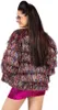 A woman wearing a colorful, fringed jacket and pink sequined shorts, shown from the back. Produktbild-Vorschau
