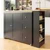 A dark gray kitchen island with a wooden countertop is shown in a well-lit room with a herringbone wood floor. The island has cabinets, drawers, and open shelving displaying bottles and jars. Anteprima dell’immagine prodotto