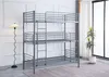 A triple bunk bed in a room with a lamp and a plant. Voir les images du produit