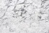 A close-up view of a textured rug with a gray and white abstract pattern. Produktbild-Vorschau