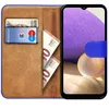 A flip case for a smartphone, showing cards and cash inserted. Podgląd zdjęcia produktu